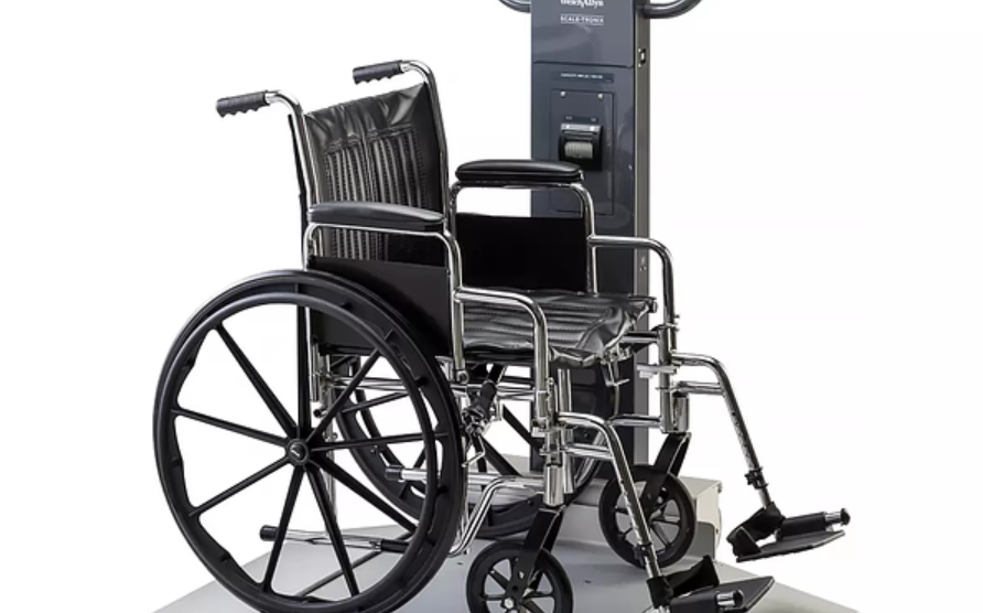 Healthcare professional weighing patient on calibrated medical scale in clinic